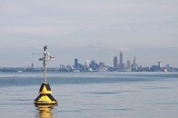 A buoy near the Cleveland Water intake—approximately 3.5 miles off the Cleveland shoreline—gives researchers at NOAA GLERL the ability to incorporate water temperature, pH, turbidity, dissolved oxygen and other parameters into their Experimental Hypoxia Forecast model. This allows water treatment managers enough time to anticipate and respond to changes in lake water quality before it is drawn into their treatment plants. Photo Credit: Ed Verhamme, Limnotech